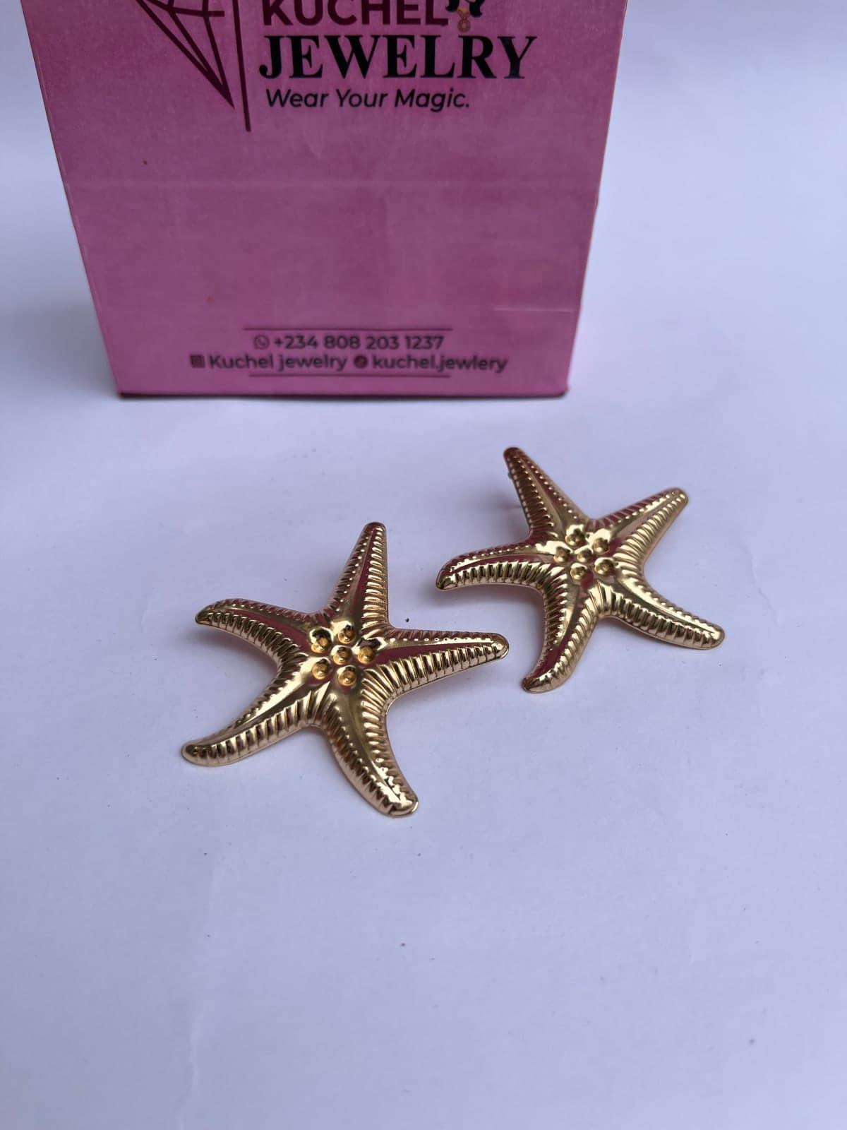 Gold starfish fashion earrings