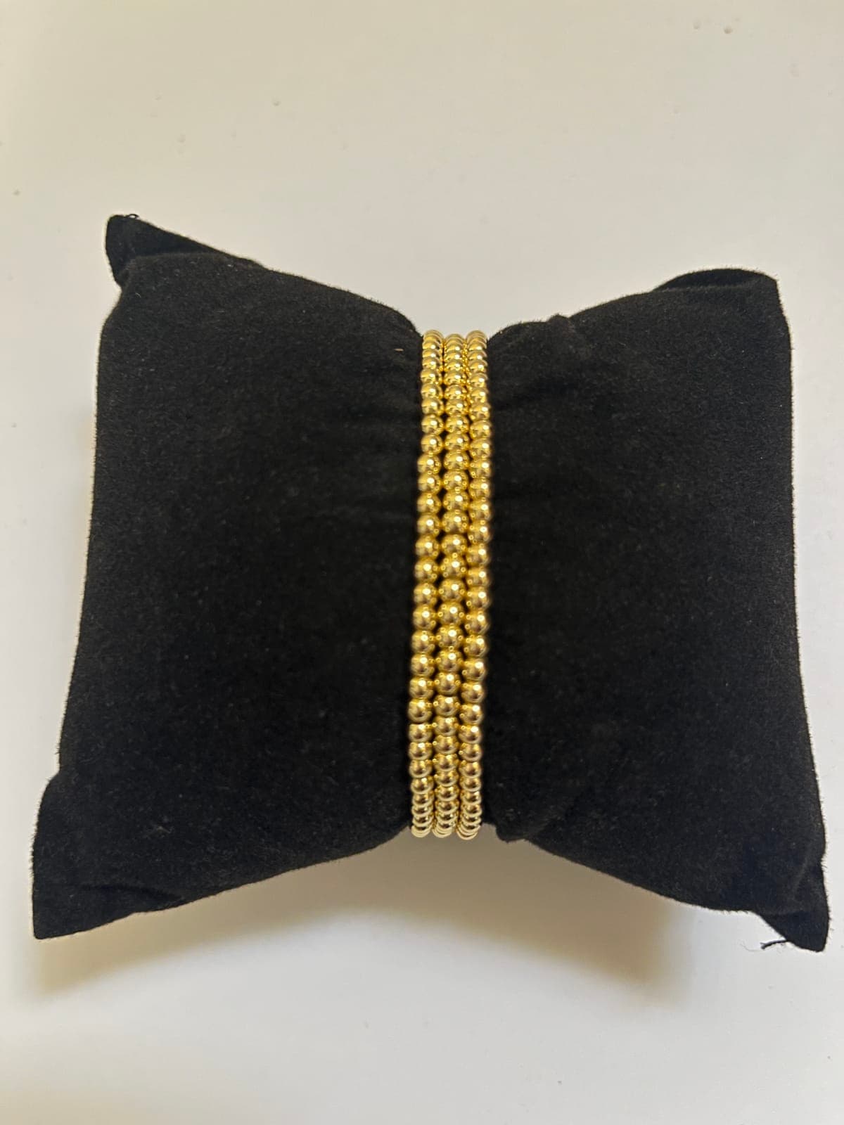 Gold-beaded bracelet set (3)